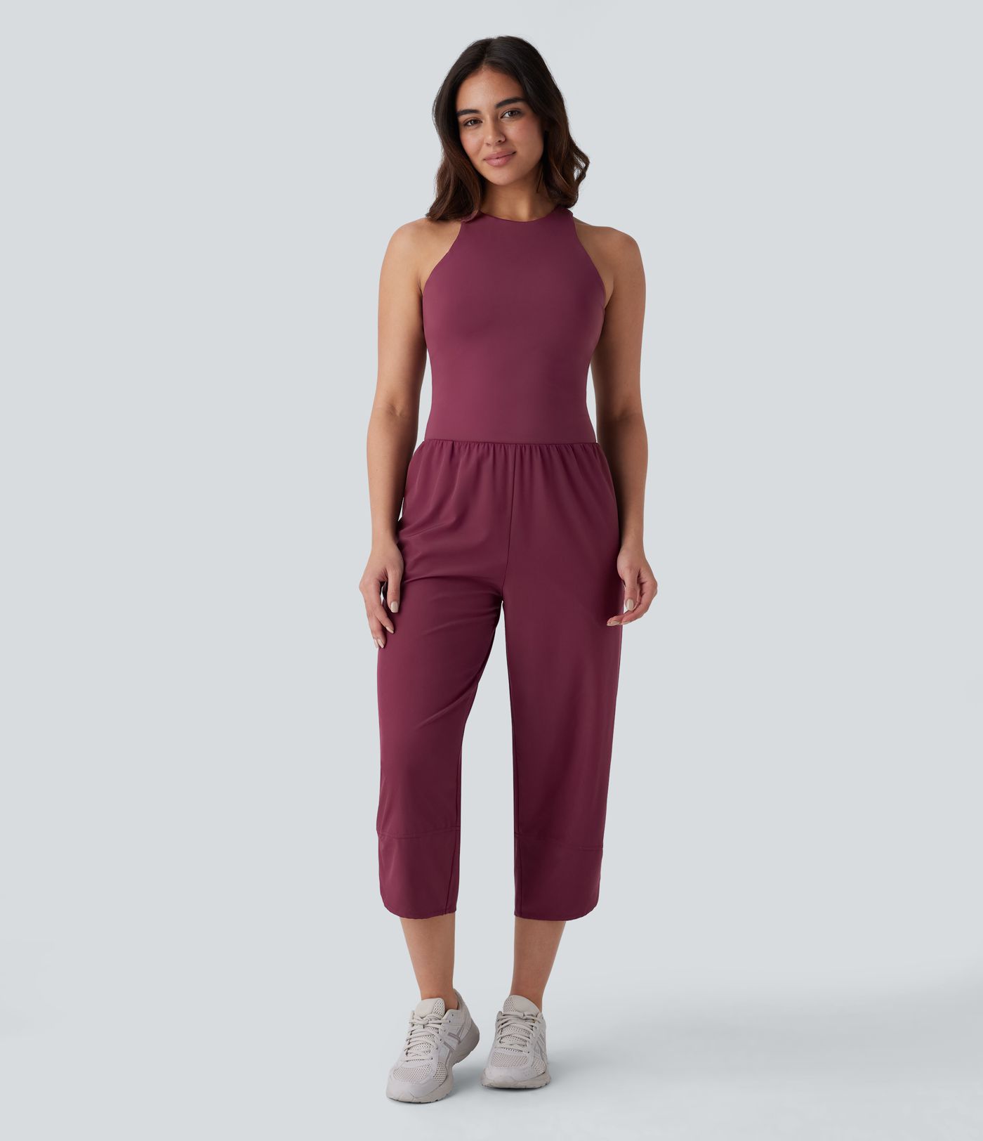 Breezeful™ - Rückenfreier, ärmelloser Yoga-Jumpsuit mit Seitentaschen, Knopfleiste und überkreuztem Saum - schnelltrocknend