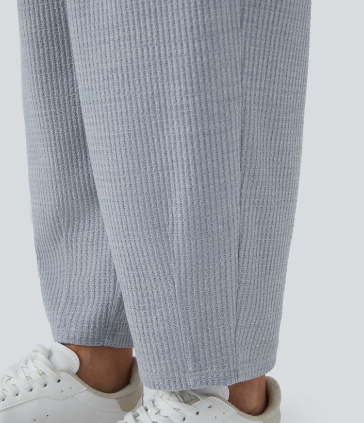 Pantalón múltiple bolsillo cierre botón tiro medio