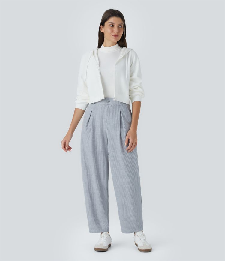 Pantalón múltiple bolsillo cierre botón tiro medio