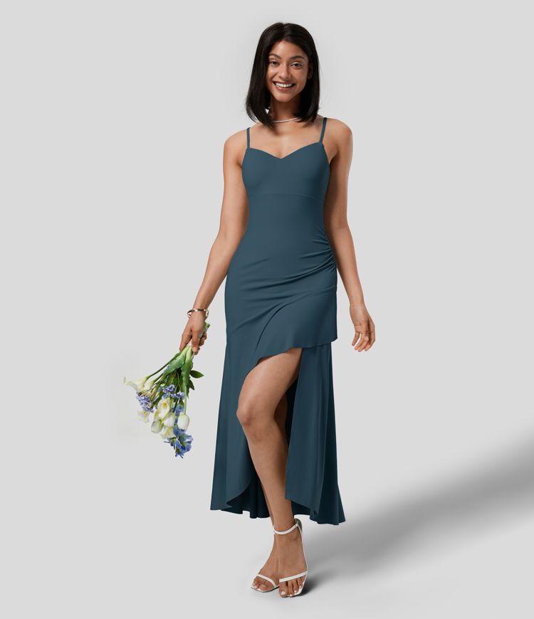 Backless, flowing maxi dress with adjustable straps and ruffled slit for bridesmaids and wedding guests