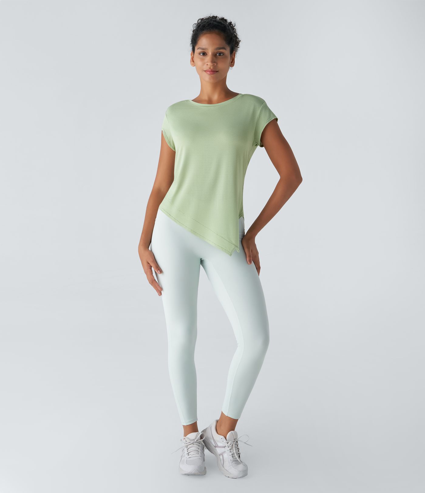 Top deportivo yoga jacquard dobladillo asimétrico dividido manga corta cuello redondo transparente