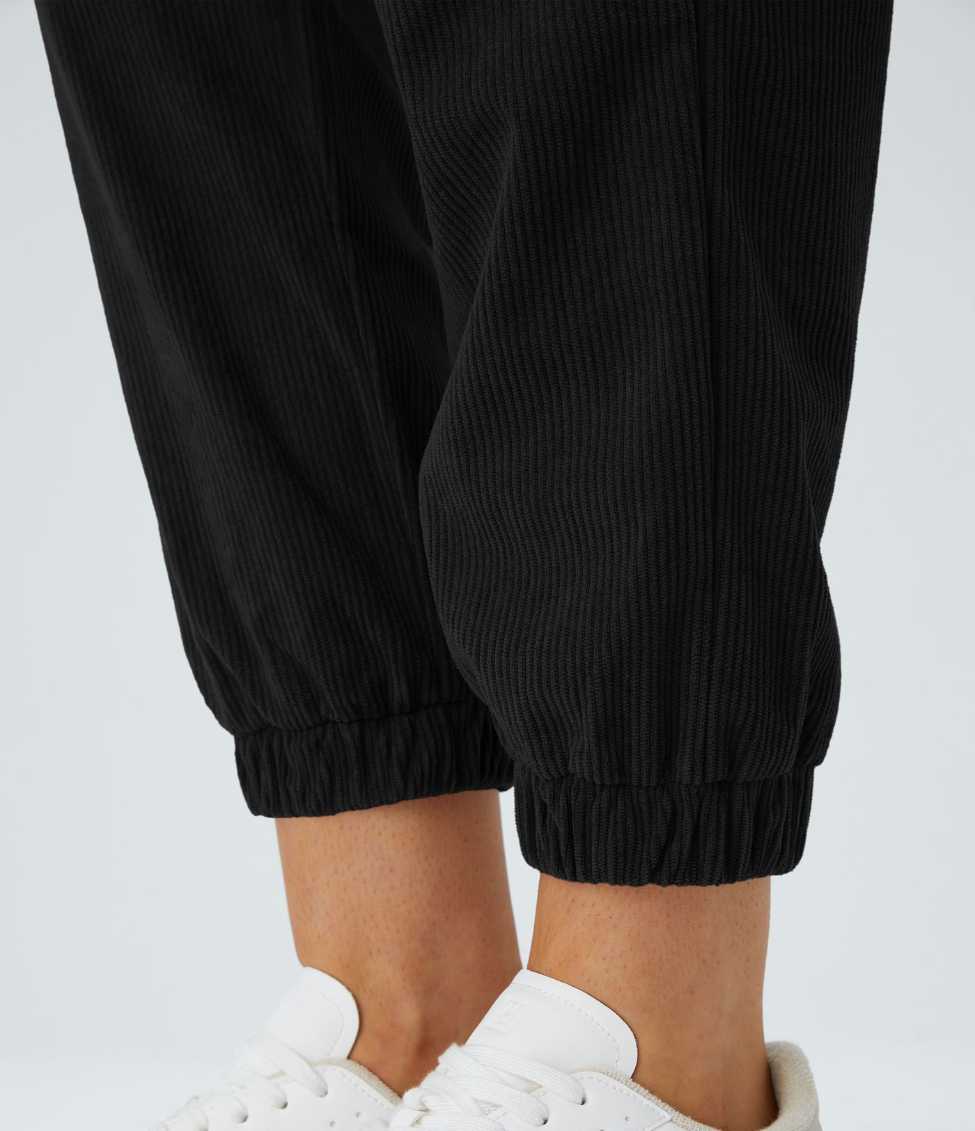 Pantalons de cyclisme en velours côtelé, taille mi-haute, coupe décontractée, avec poches zippées.