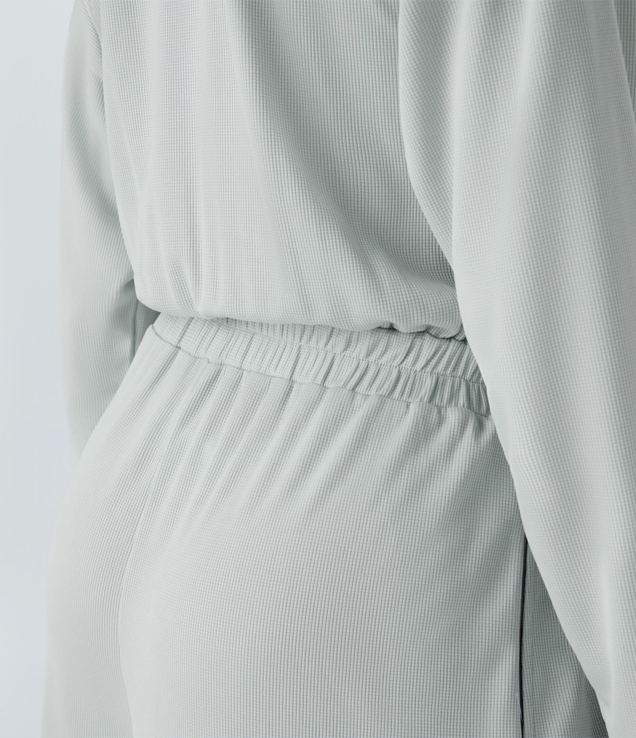 Mono cuello V manga larga bolsillo lateral plisado pierna ancha