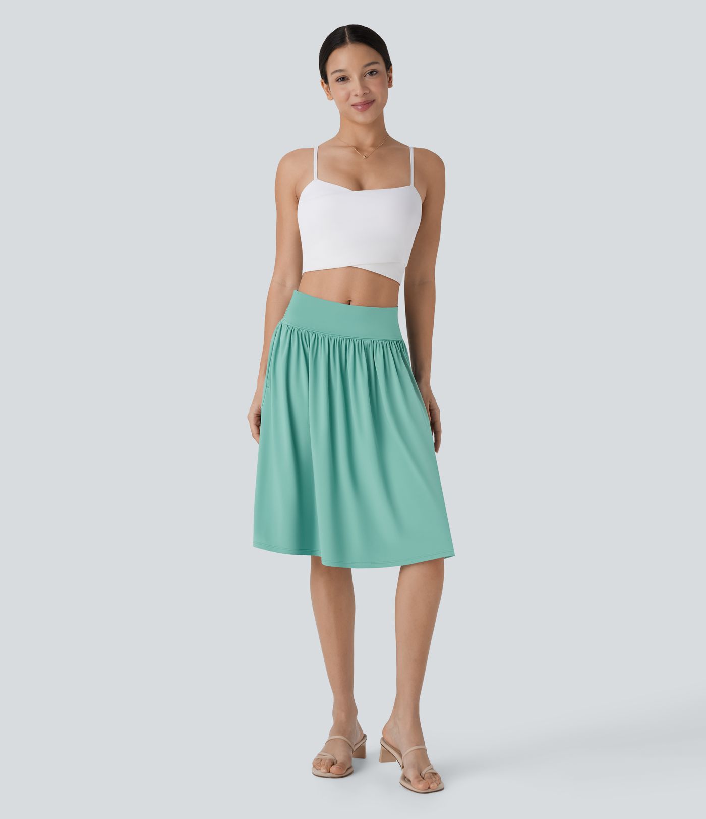 Falda midi acampanada bolsillo lateral tiro medio plegable resort