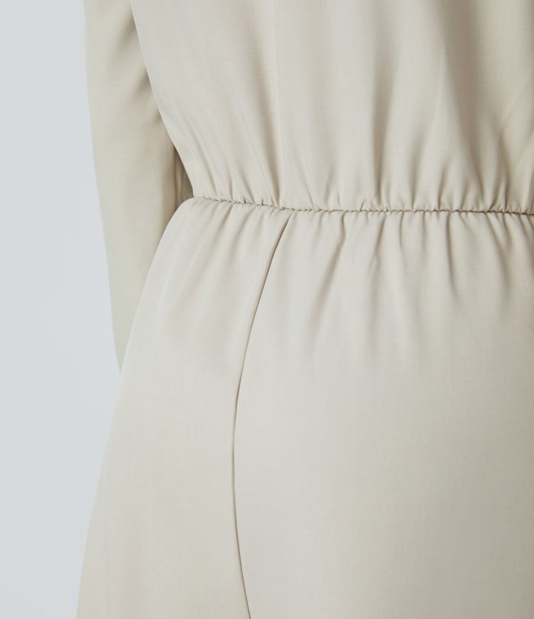 Mono pierna ancha bolsillo lateral cruzado manga larga cuello V botón