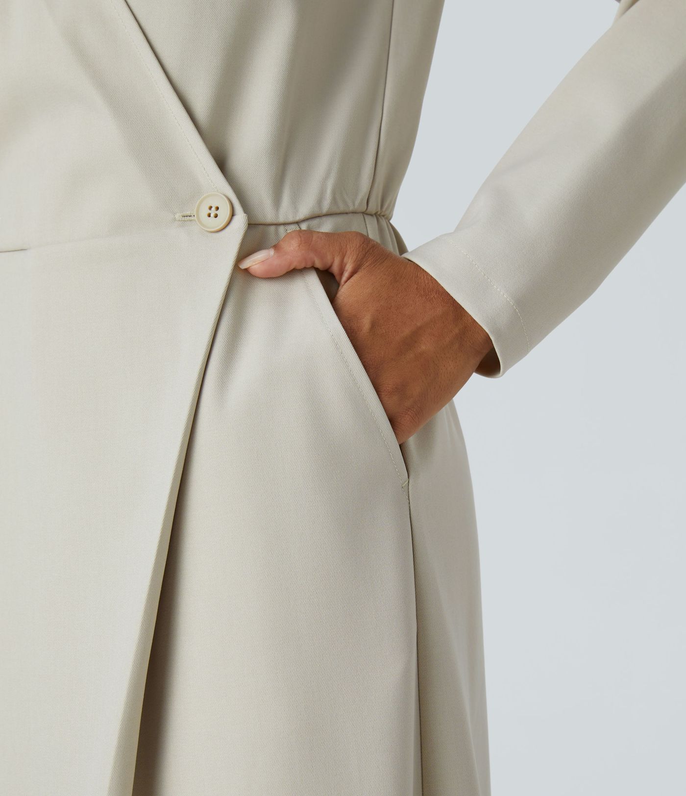 Mono pierna ancha bolsillo lateral cruzado manga larga cuello V botón