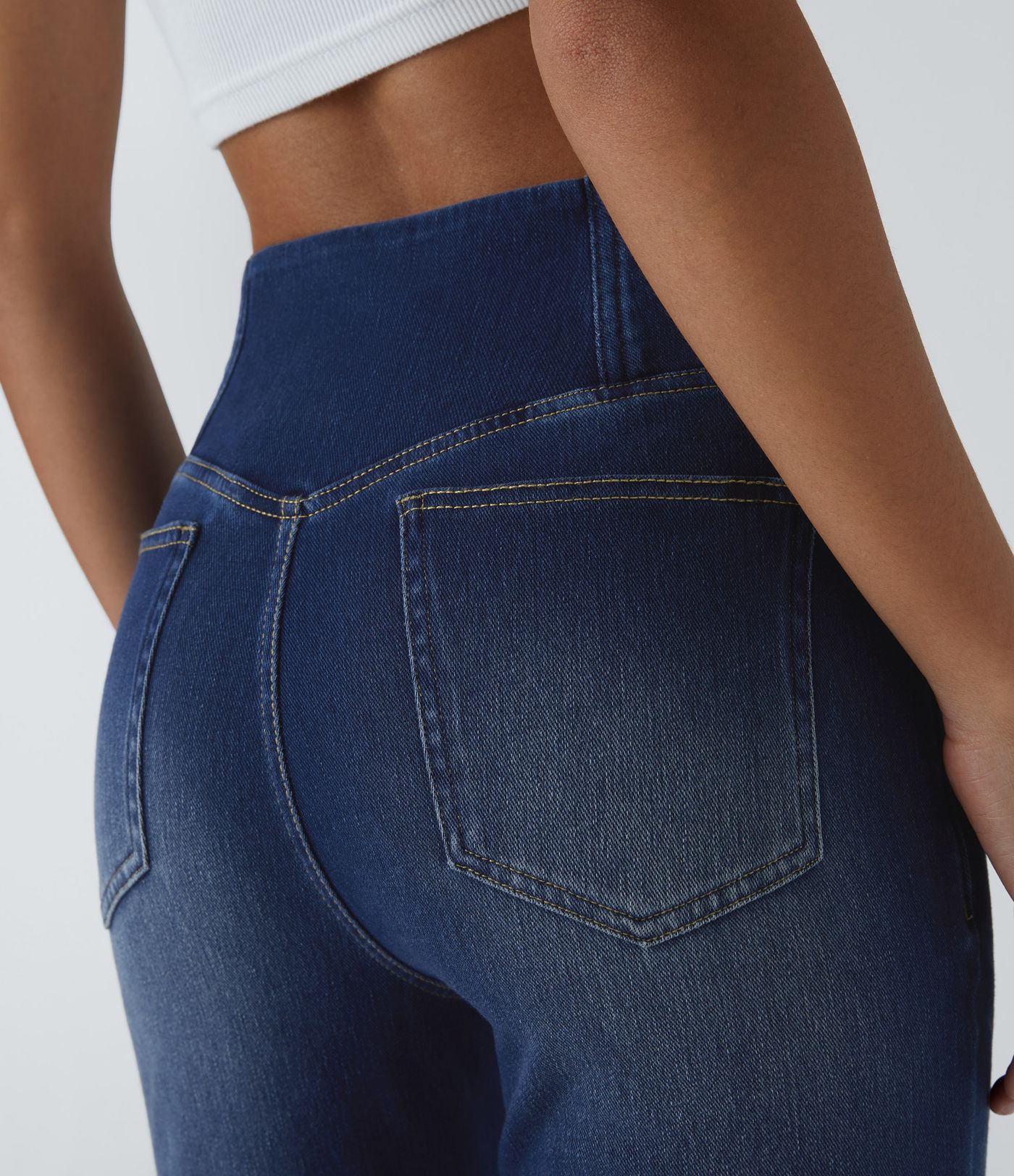 Halara Flex™ High-Rise Crossed Elastic Flare Denim Jeans in Bleached with Pockets