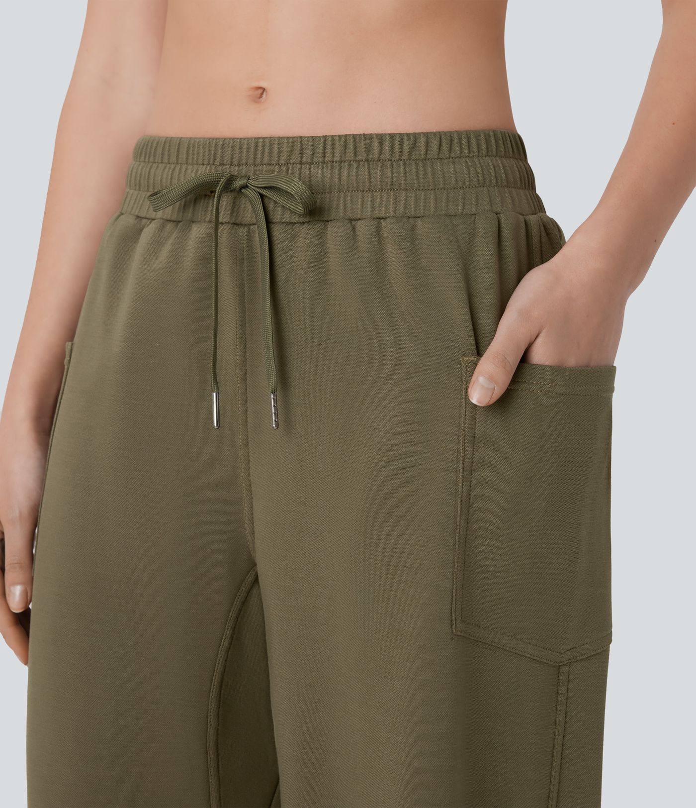 Pantalones casuales ajustados de tiro bajo con bolsillos laterales y cordón