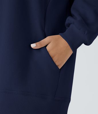 Sweat-shirt déstructuré en polaire oversize à manches longues et rondes avec poche