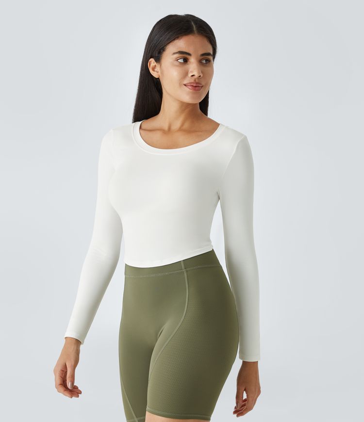 Top deportivo cut out de manga larga con espalda ligeramente descubierta