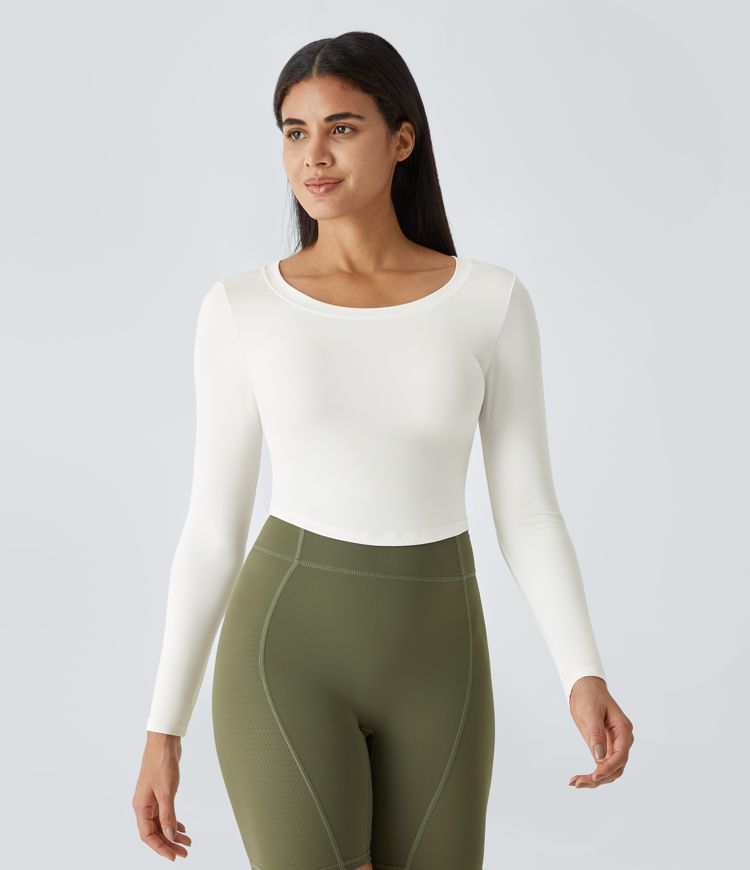 Top deportivo cut out de manga larga con espalda ligeramente descubierta