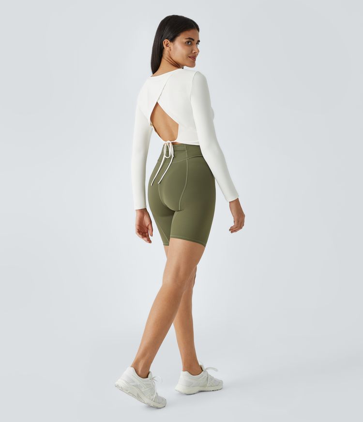 Top deportivo cut out de manga larga con espalda ligeramente descubierta