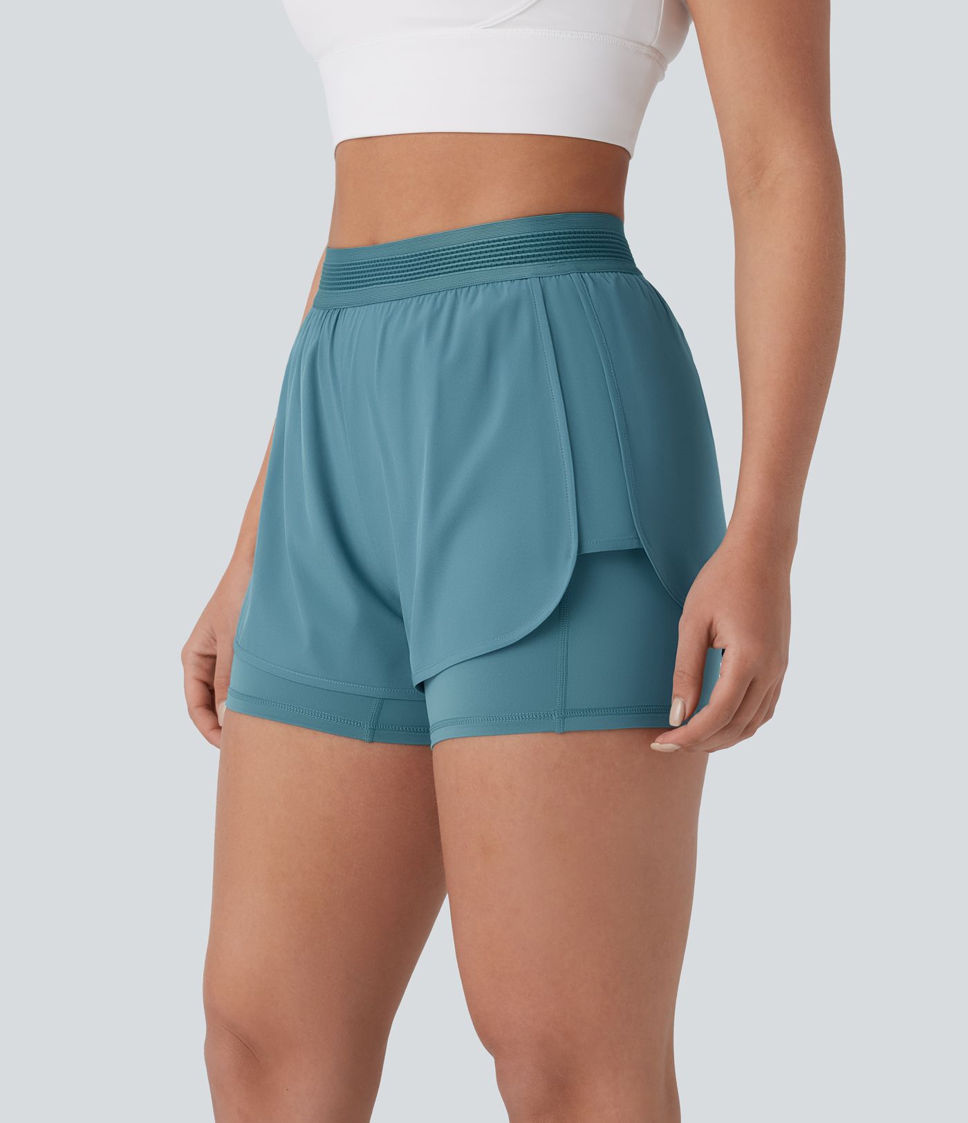 Pantalón corto Breezeful™ correr secado rápido 2 en 1 tiro medio bolsillo lateral