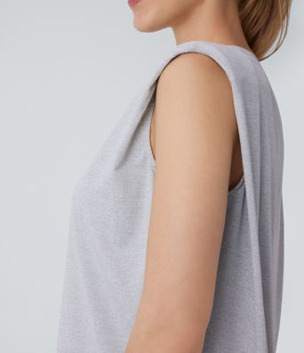 Blusa oficina sin mangas hombrera cuello redondo