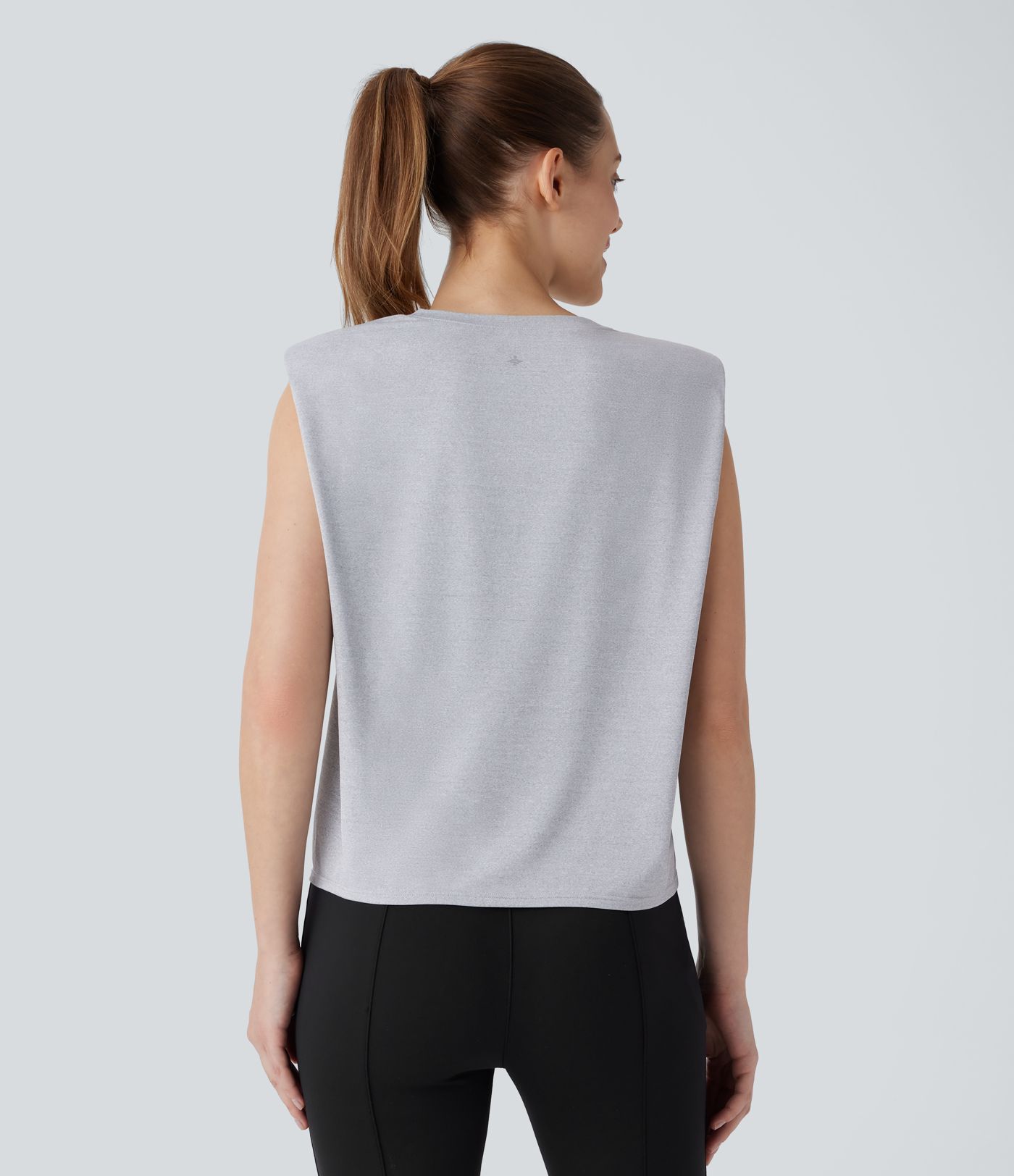 Blusa oficina sin mangas hombrera cuello redondo