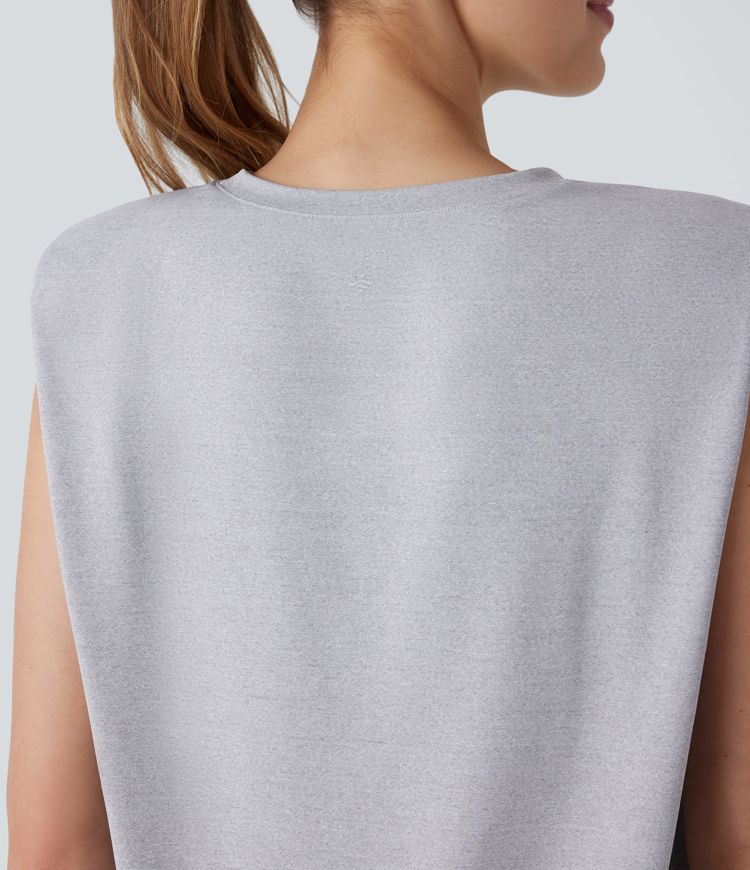 Blusa oficina sin mangas hombrera cuello redondo