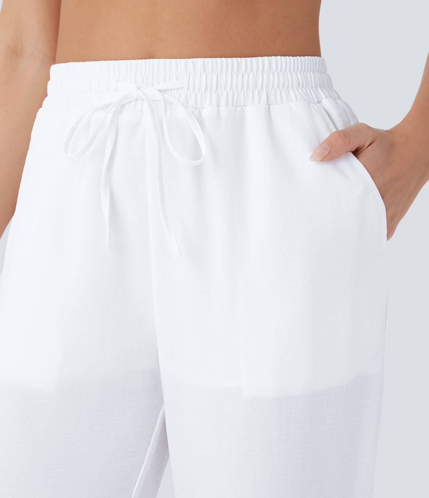 Pantalón capri lino tiro alto cordón ajustable bolsillo múltiple abertura