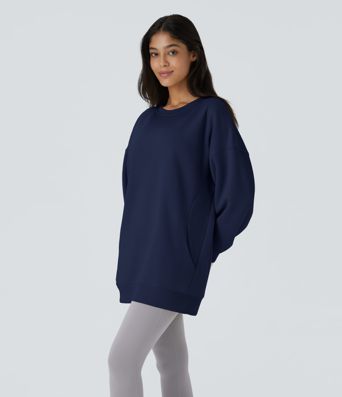 Sweat-shirt déstructuré en polaire oversize à manches longues et rondes avec poche