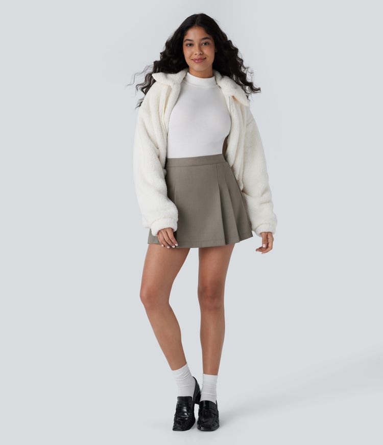 Mini-jupe plissée taille haute 2-en-1 avec fermeture éclair invisible