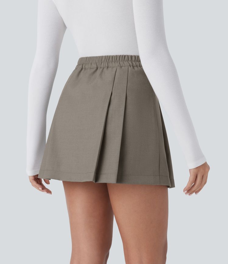 Mini-jupe plissée taille haute 2-en-1 avec fermeture éclair invisible