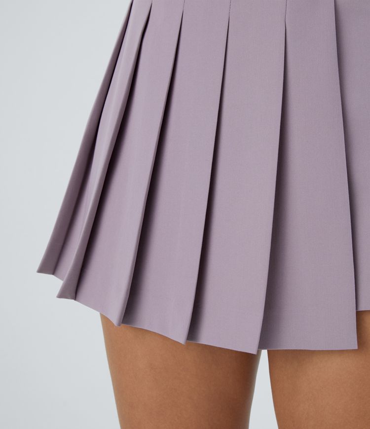 Short décontracté taille haute, fermeture éclair invisible, plis au dos et poches latérales