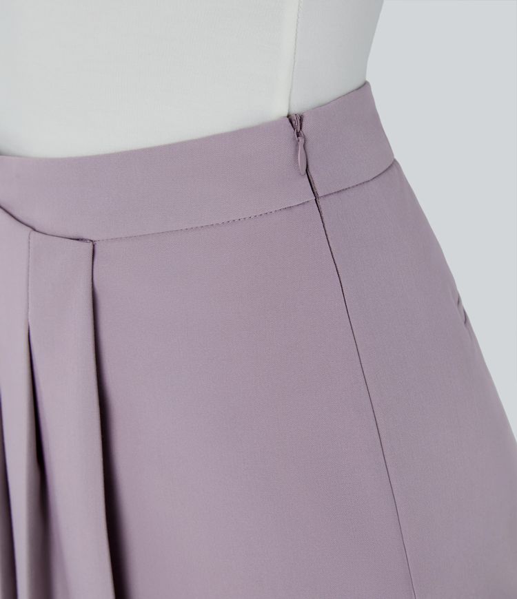 Short décontracté taille haute, fermeture éclair invisible, plis au dos et poches latérales