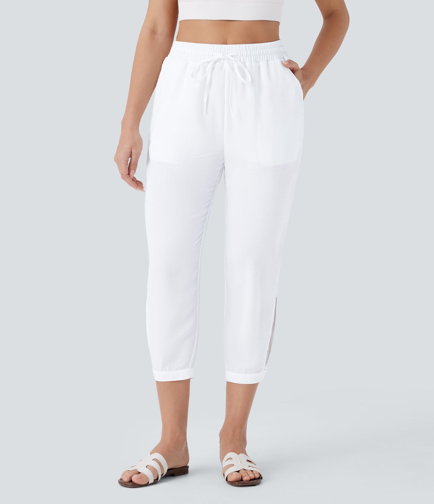 Pantalón capri lino tiro alto cordón ajustable bolsillo múltiple abertura