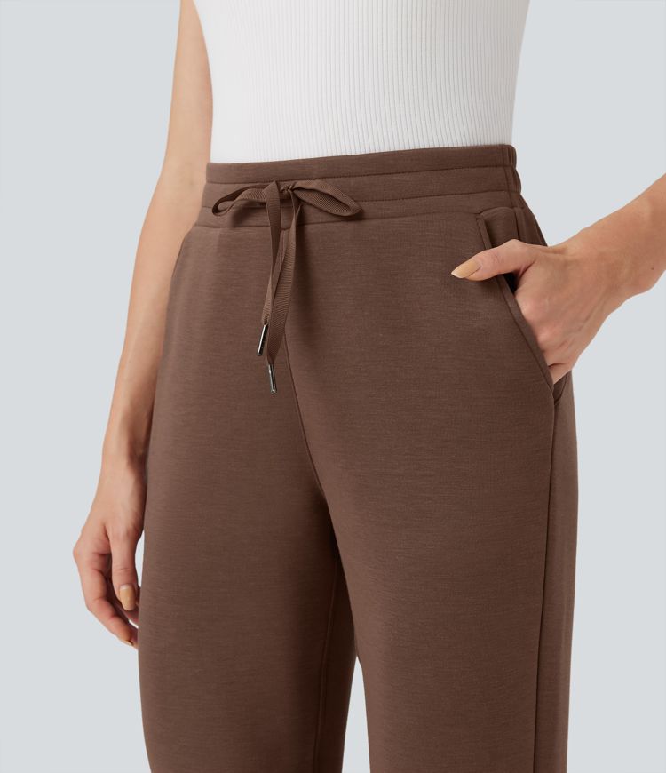 Pantalones casuales de tiro alto con cordón ajustable y dobladillo enrollado con bolsillos