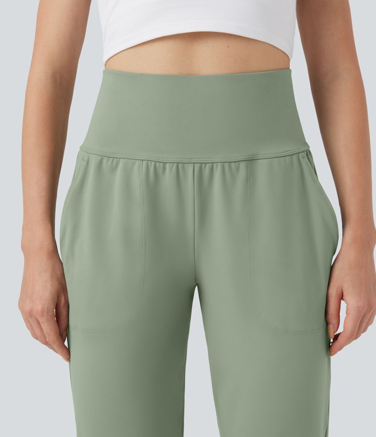 Jogging de course gainant taille mi-haute avec poches