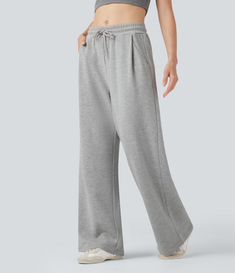 Pantalones holgados de talle medio con cordones y bolsillos