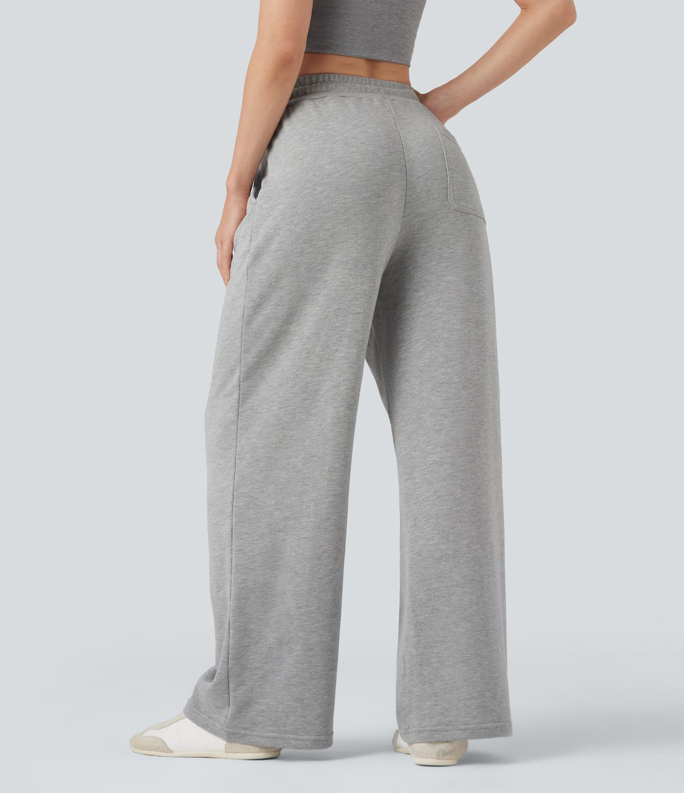 Pantalones holgados de talle medio con cordones y bolsillos