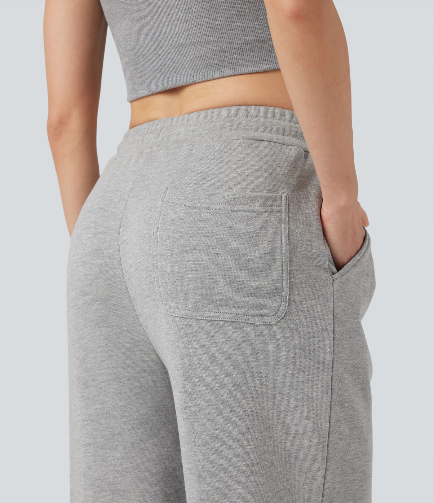 Pantalones holgados de talle medio con cordones y bolsillos