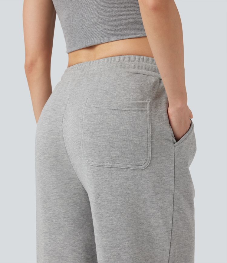 Pantalones holgados de talle medio con cordones y bolsillos