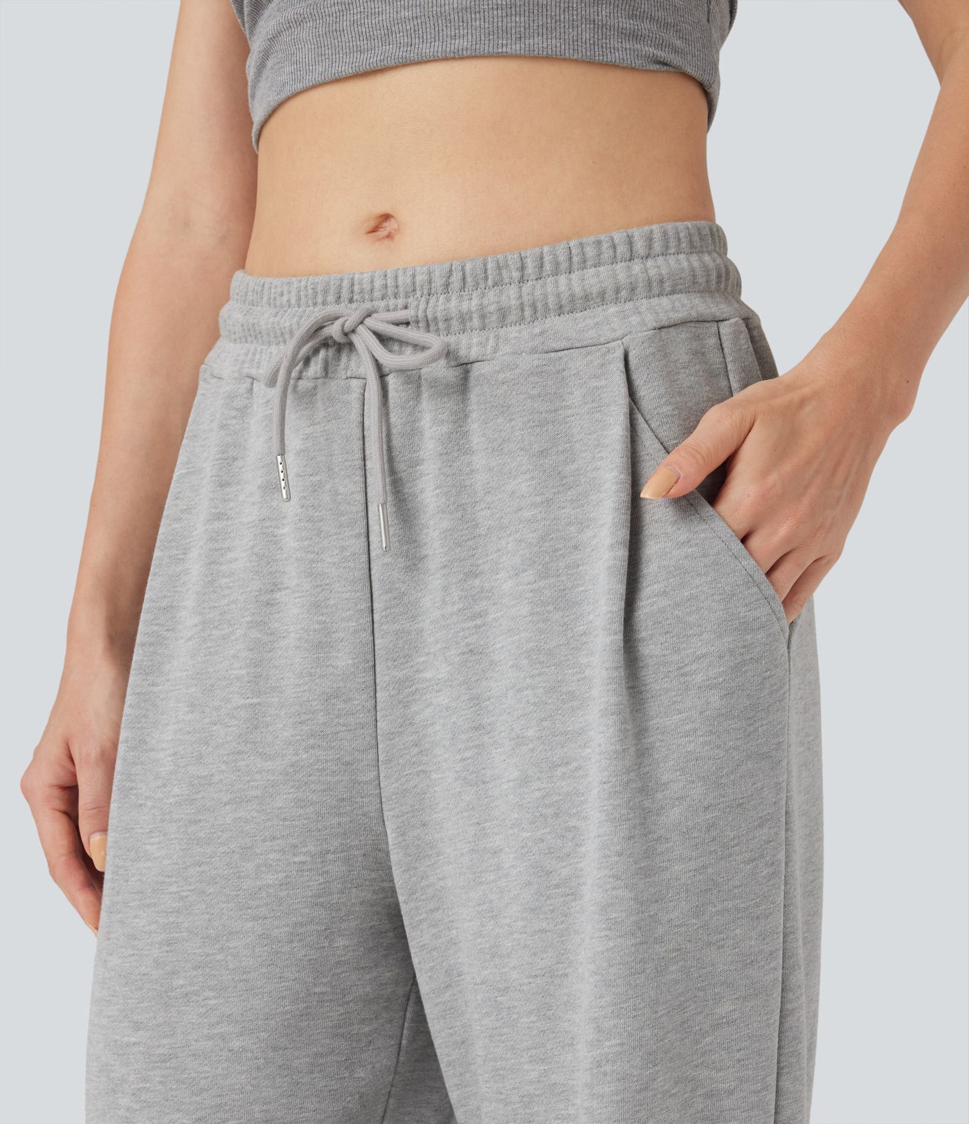 Pantalones holgados de talle medio con cordones y bolsillos