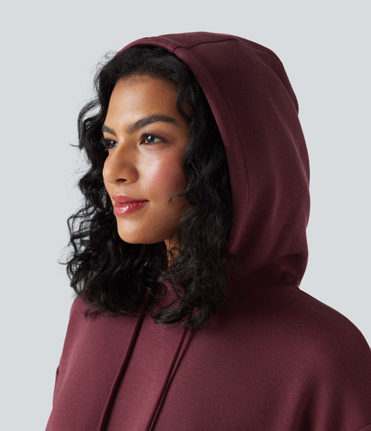 Robe sweat à capuche mini moulante manches longues froncée