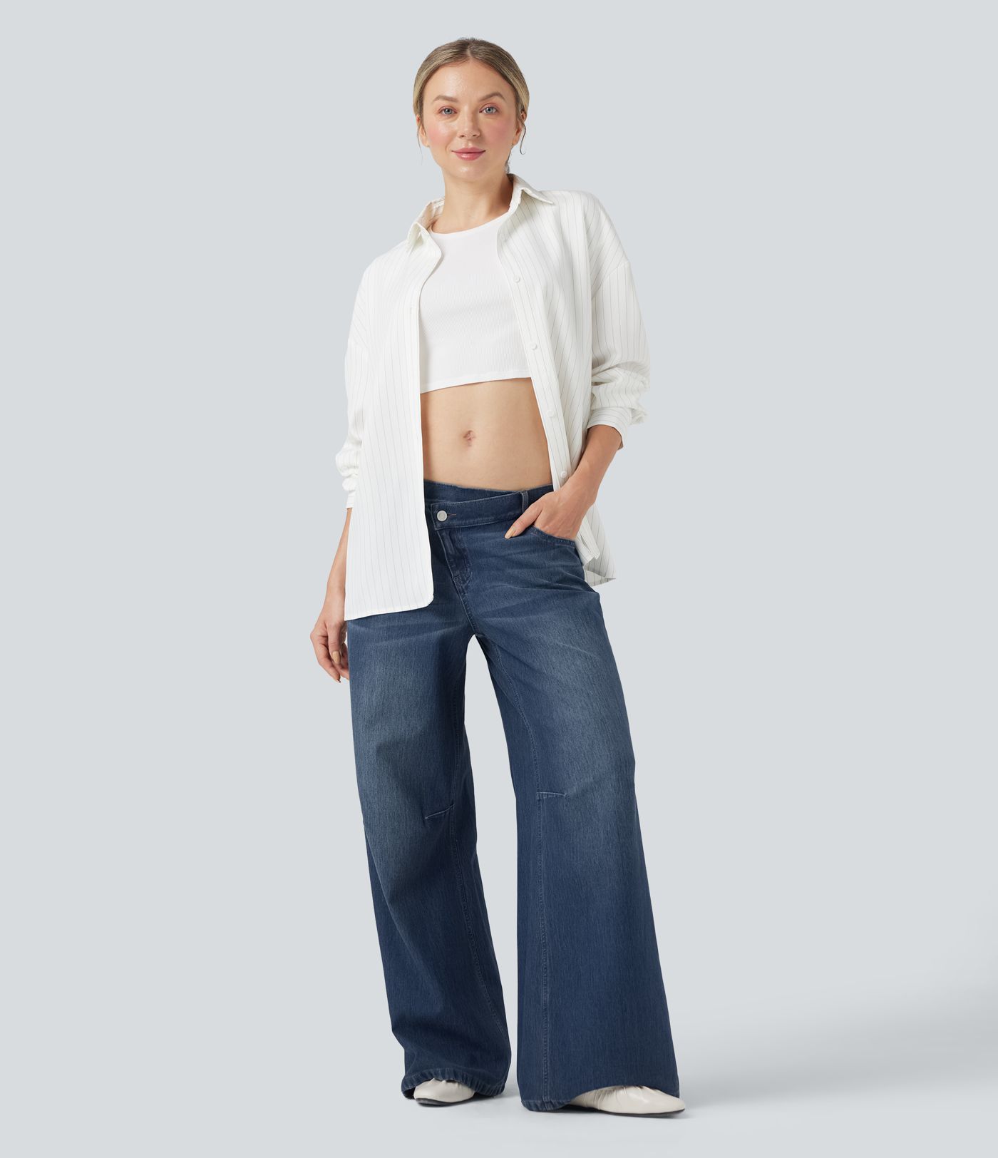 Halara Flex™ vaqueros holgados informales de tiro bajo con cintura asimétrica y bolsillos.