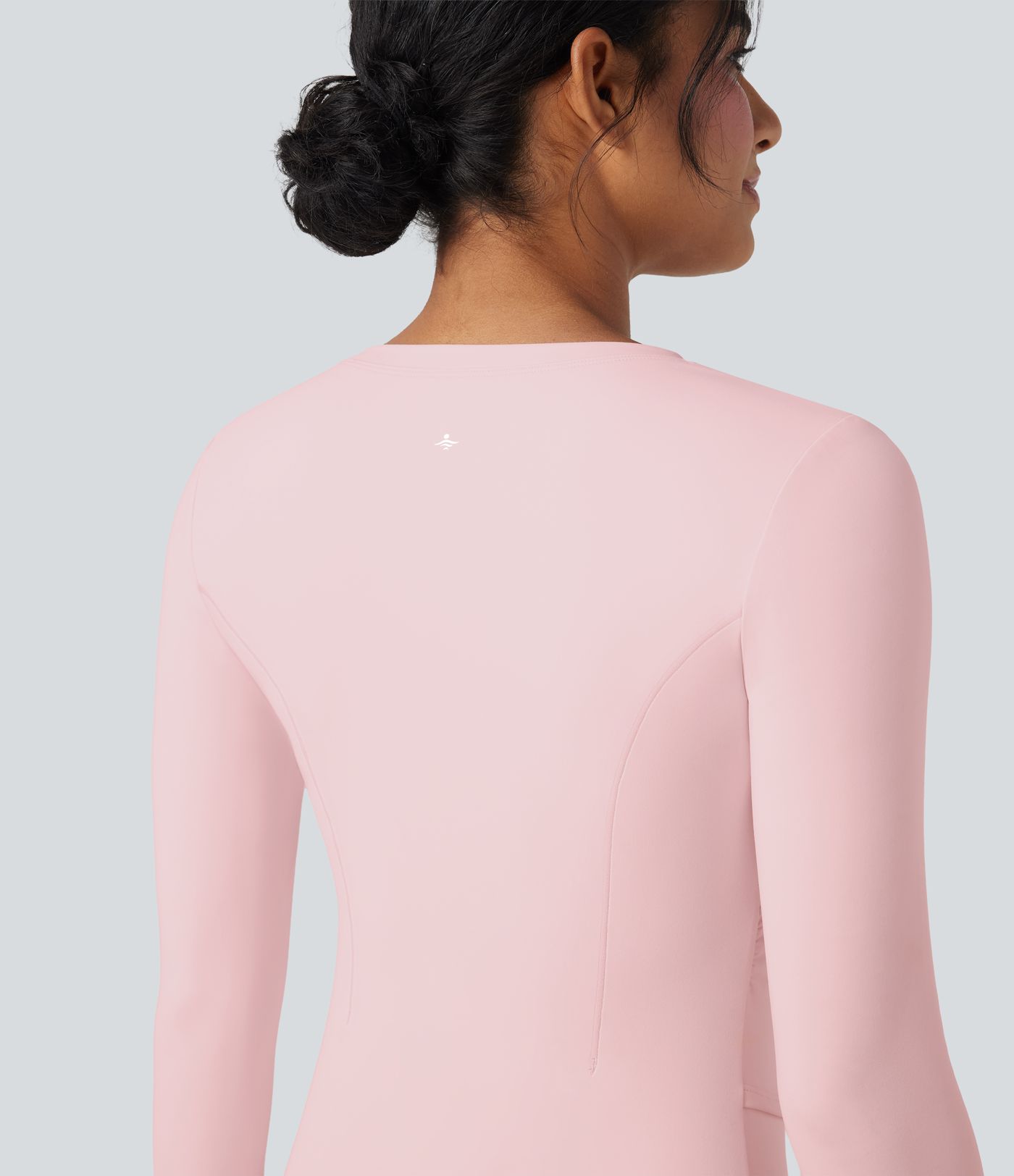 Top deportivo de yoga SoftlyZero™ manga larga afelpada con cuello redondo y aberturas para los pulgares con dobladillo cruzado