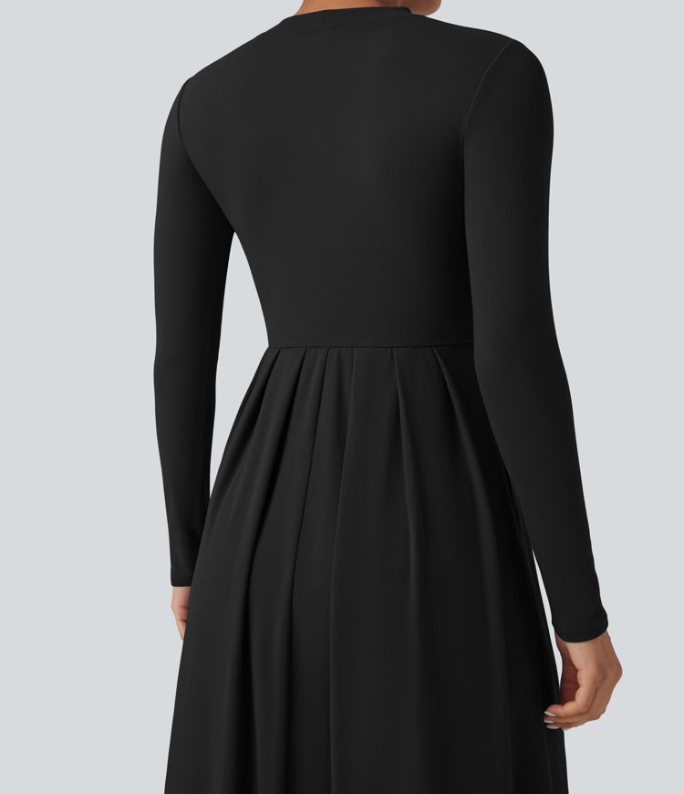 Robe longue col montant manches longues coupe évasée avec poches