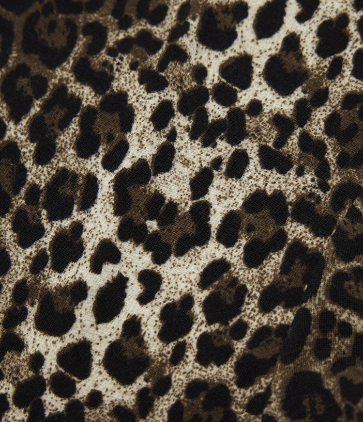 Top casual ceñido de manga larga con cuello redondo, estampado de leopardo y lazo en la espalda