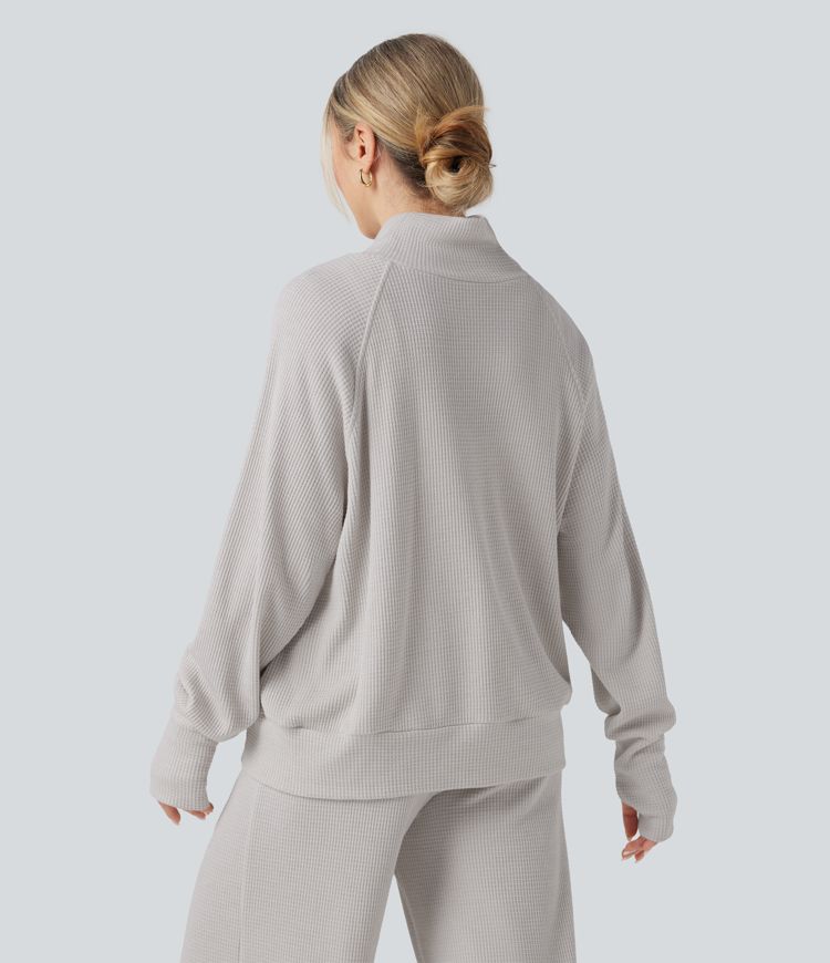 Sudadera casual de cuello alto de manga larga con aberturas para los pulgares y bolsillos