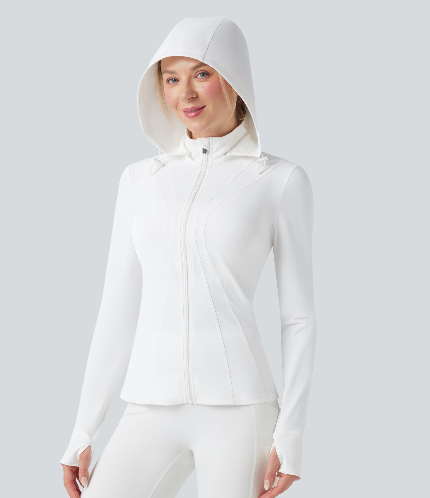 Veste de randonnée ajustée capuche amovible à trous pouces ourlet volants