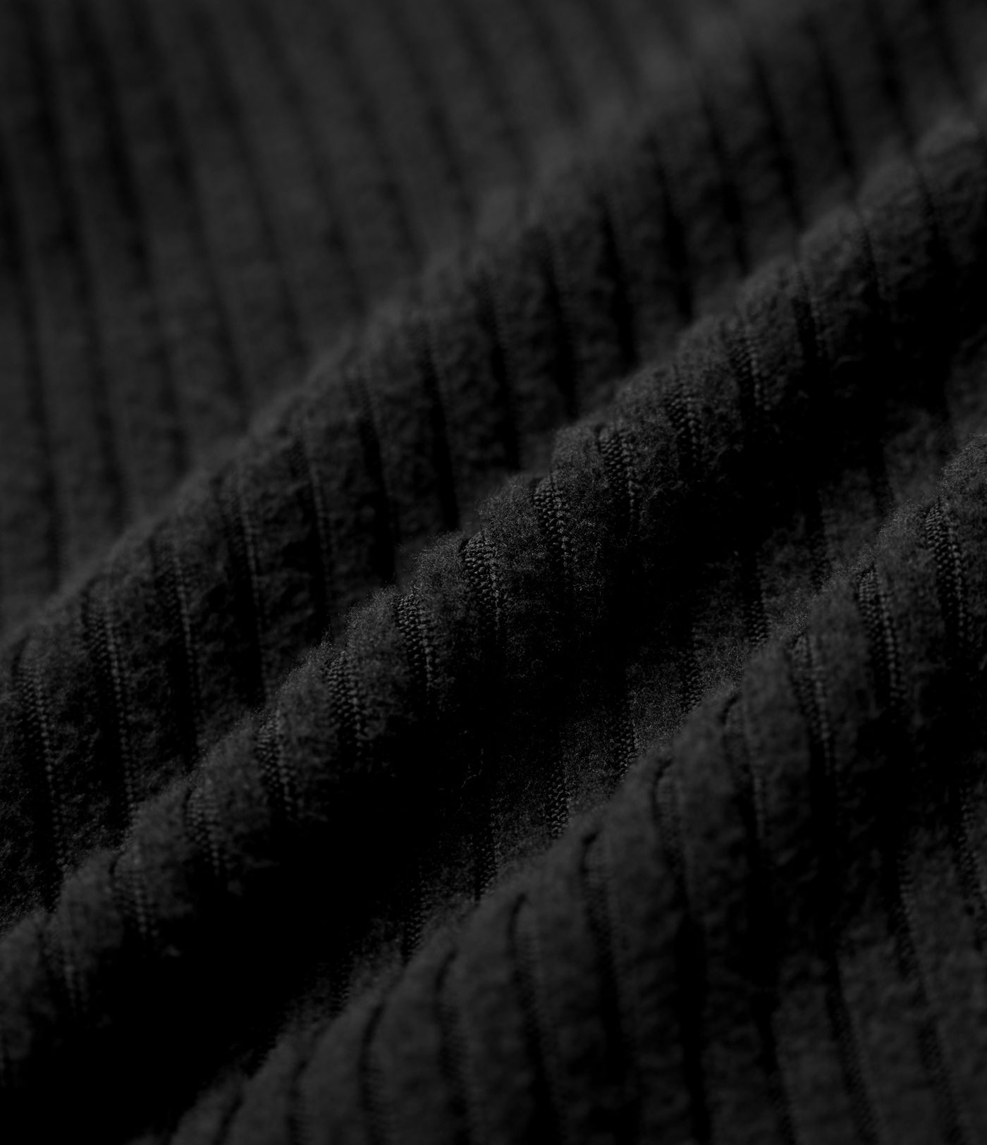 Top casual ajustado de punto acanalado con escote en V, mangas largas y efecto jaspeado