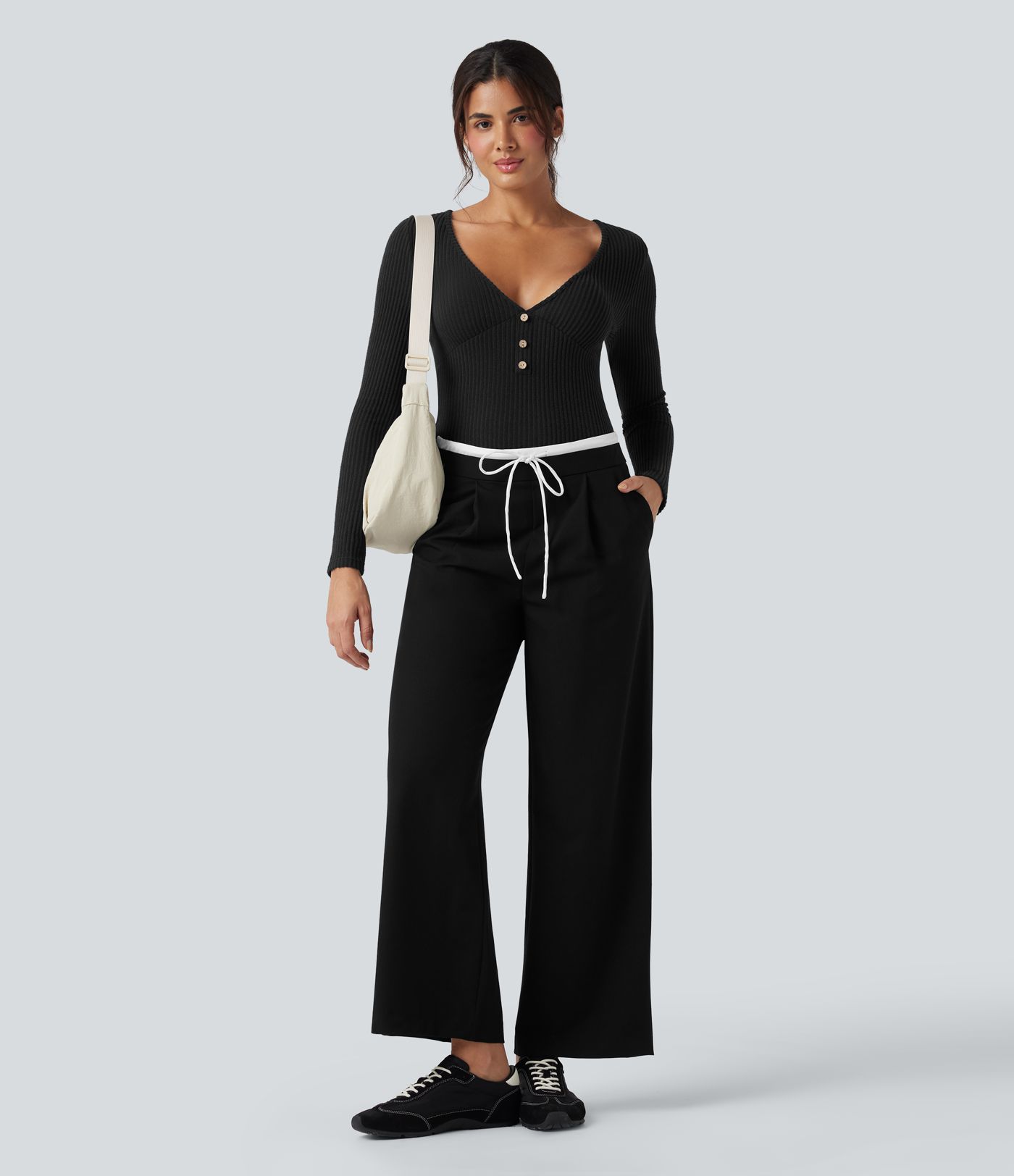 Top casual ajustado de punto acanalado con escote en V, mangas largas y efecto jaspeado