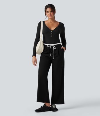 Top casual ajustado de punto acanalado con escote en V, mangas largas y efecto jaspeado