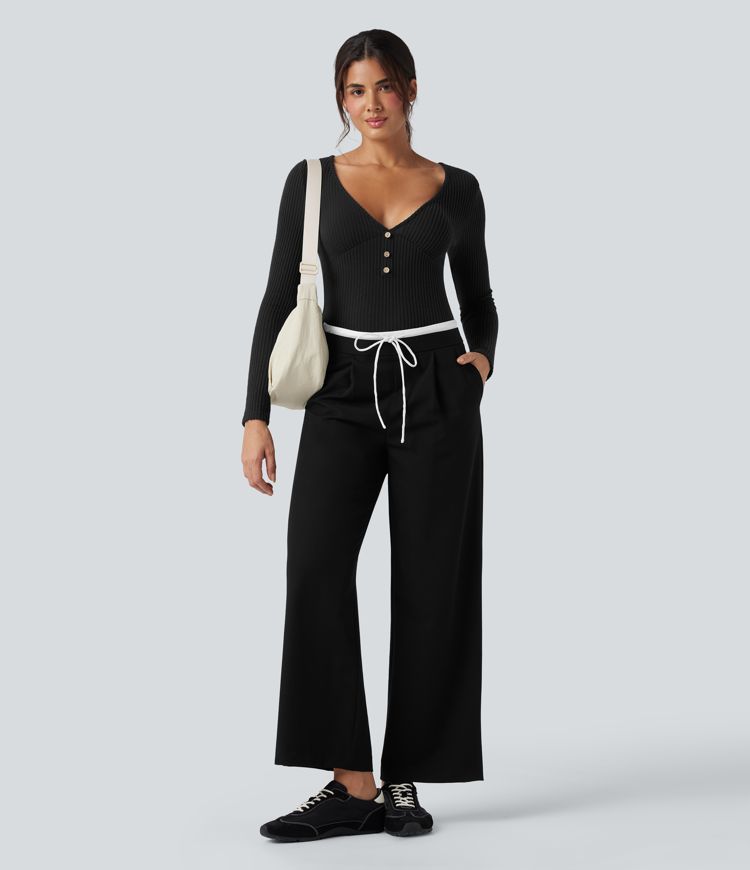 Top casual ajustado de punto acanalado con escote en V, mangas largas y efecto jaspeado