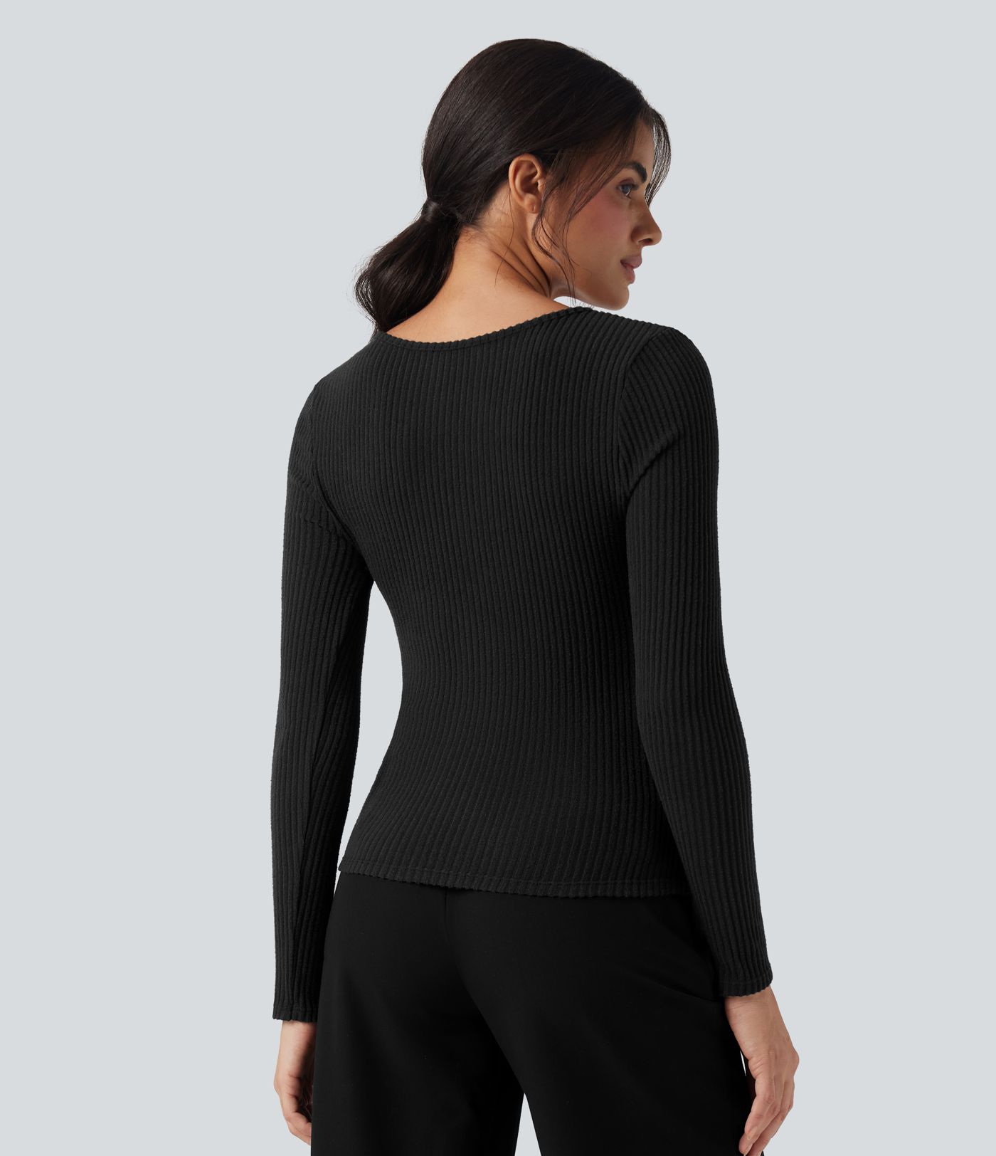 Top casual ajustado de punto acanalado con escote en V, mangas largas y efecto jaspeado