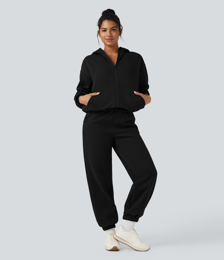 Kapuutsiga, tõmblukuga fliisist vabaajapusa taskutega