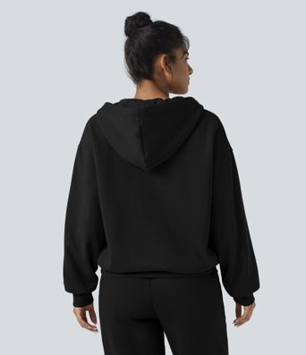 Kapuutsiga, tõmblukuga fliisist vabaajapusa taskutega