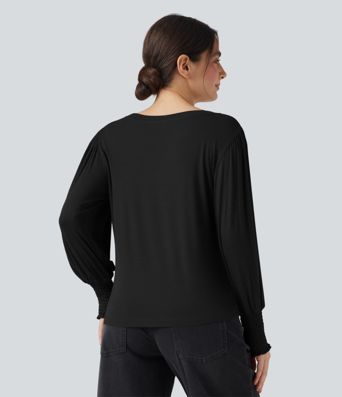 Hversdagslegur toppur með hringháls og púffermum