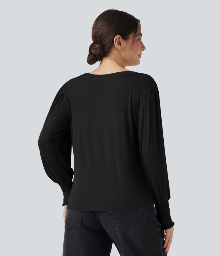 Hversdagslegur toppur með hringháls og púffermum